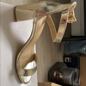 Gold snake print heels